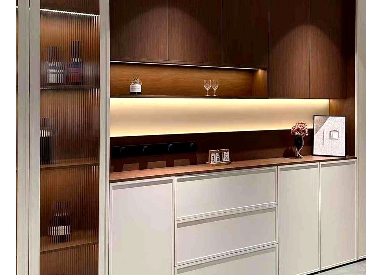 Custom wardrobes and closet systems, soft-close drawers, fluted glass doors